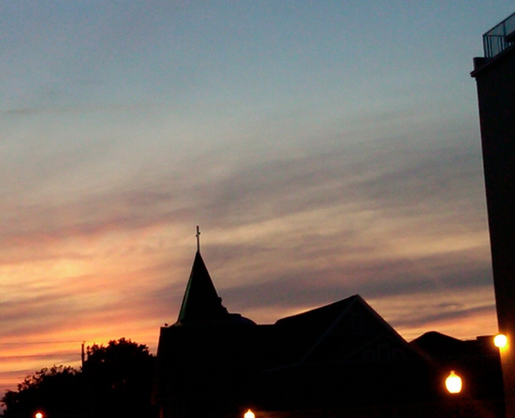 sunset over church